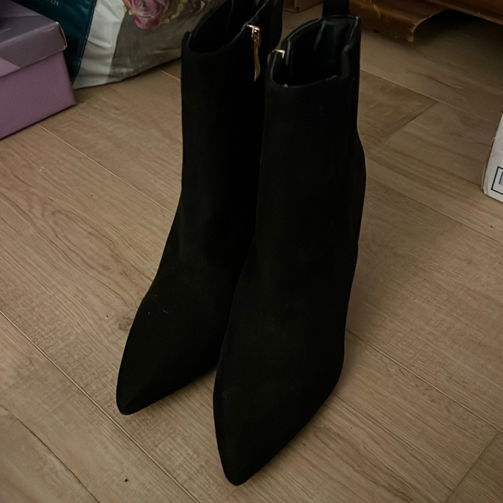 Black pointed toe booties